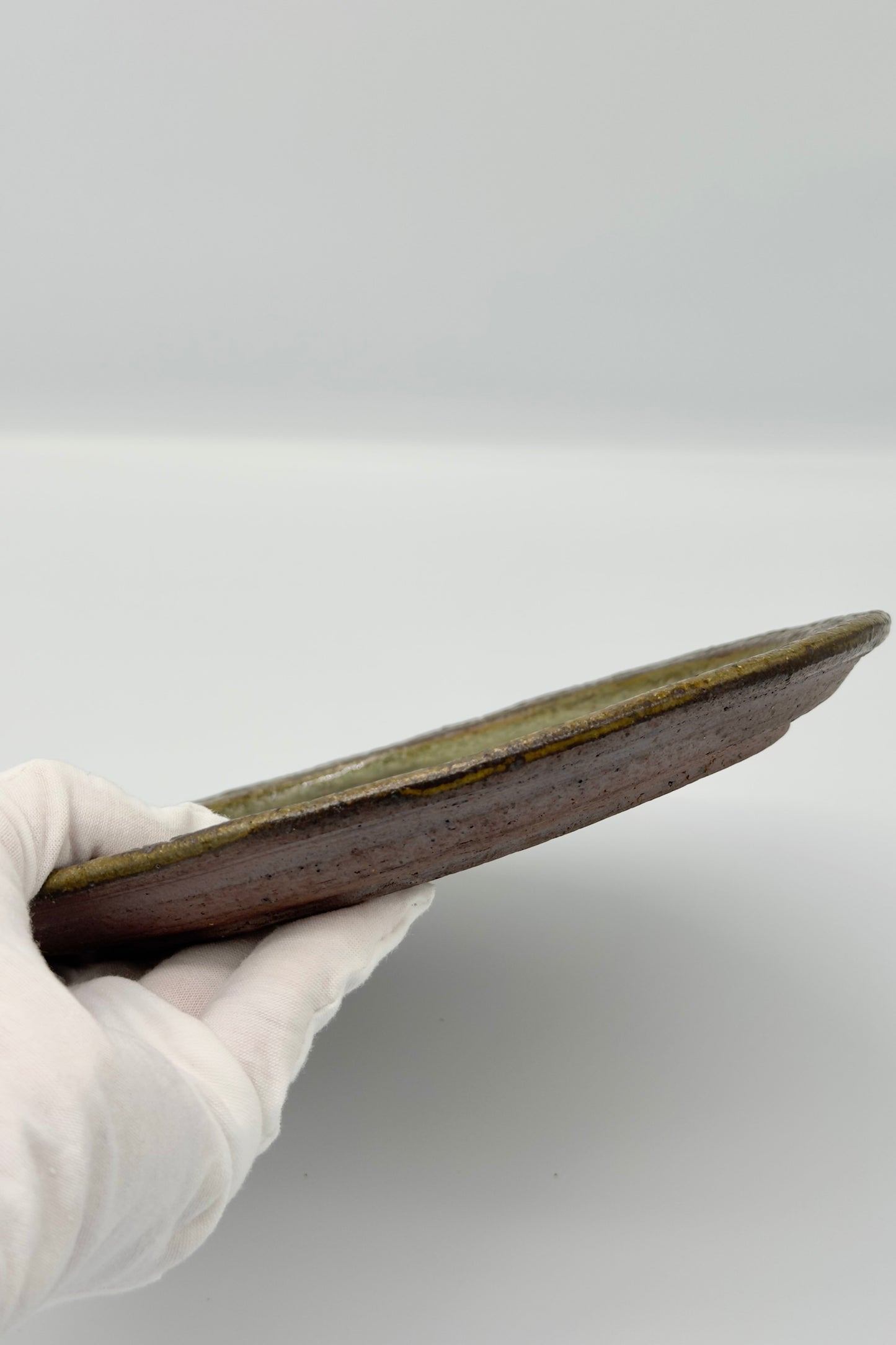 Yachimun Plate – Sage Green & Rust Glaze with Rock-Textured Rim by Paul Lorimer (019-PL)