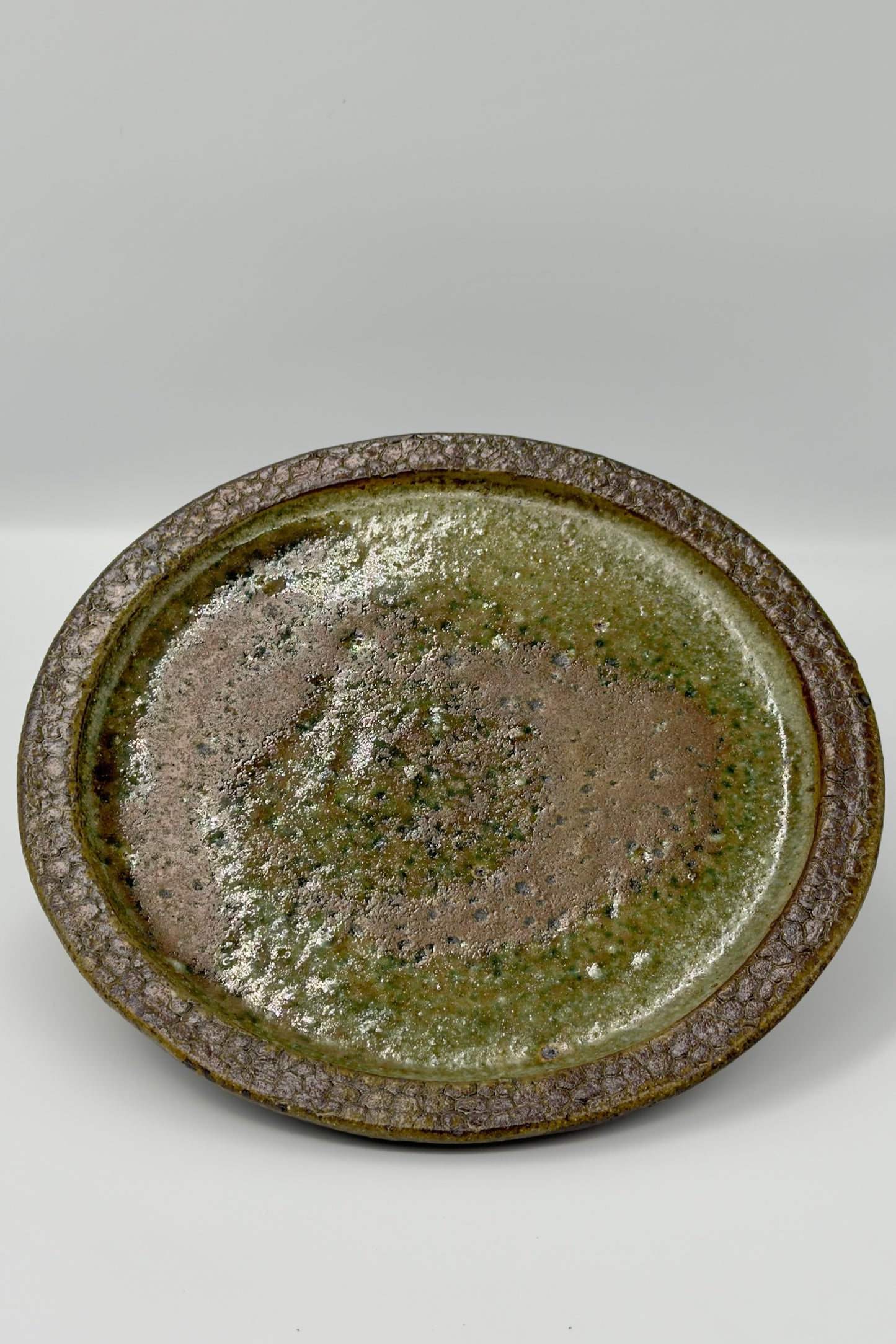 Yachimun Plate – Sage Green & Rust Glaze with Rock-Textured Rim by Paul Lorimer (019-PL)