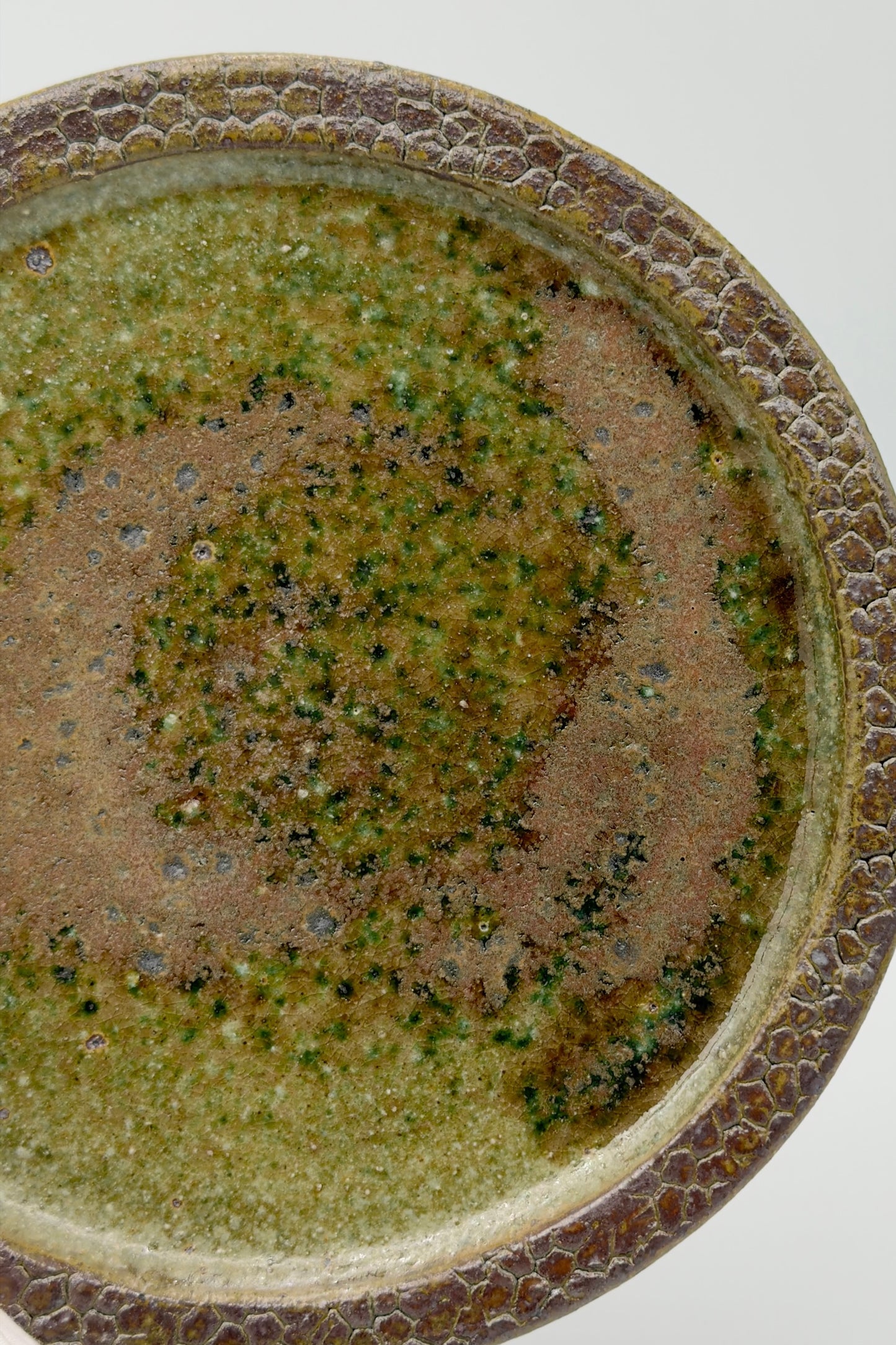 Yachimun Plate – Sage Green & Rust Glaze with Rock-Textured Rim by Paul Lorimer (019-PL)